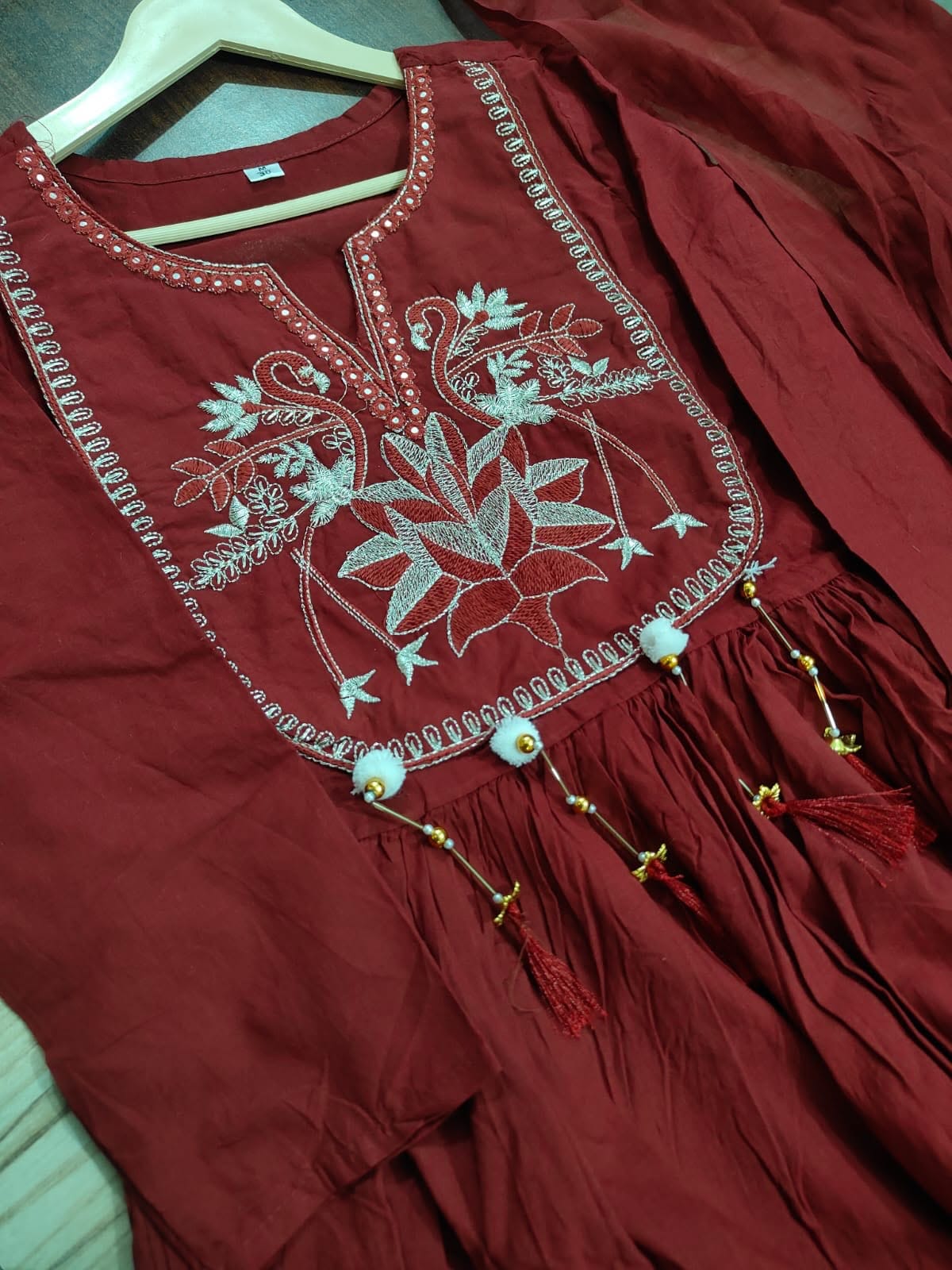 Label Tanuja-Seize the day" with a classy self weave embroidered suit Set