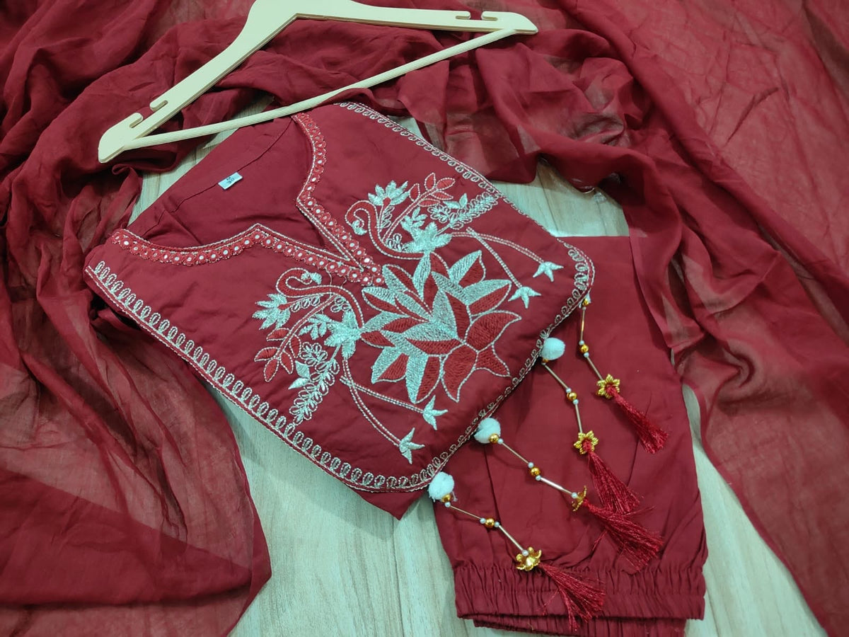 Label Tanuja-Seize the day" with a classy self weave embroidered suit Set