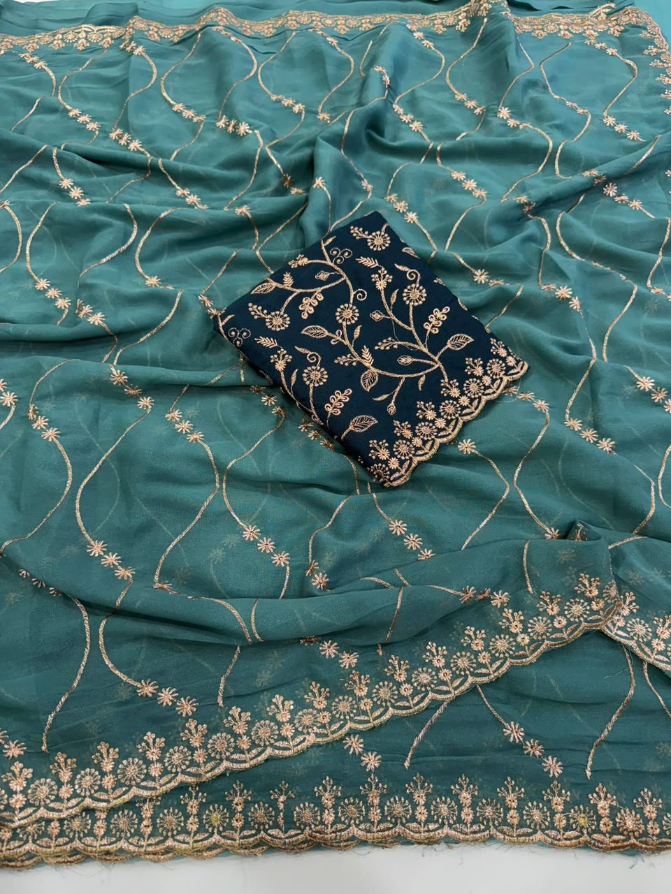 Label Tanuja-Star Georgette Emrodairy Work Saree With Contrast Blouse