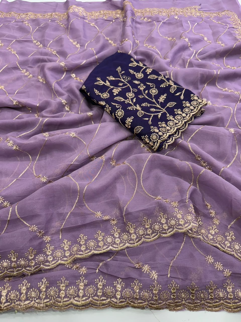 Label Tanuja-Star Georgette Emrodairy Work Saree With Contrast Blouse