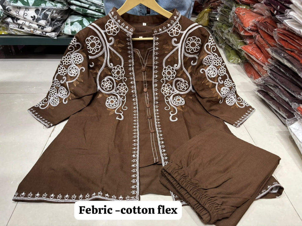 Label Tanuja- jacket style top ,inner and straight trousers, crafted in cotton flex fabric.