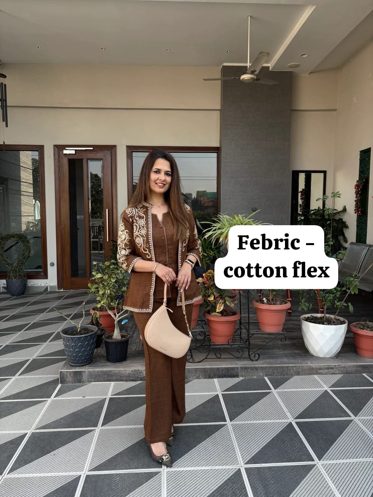 Label Tanuja- jacket style top ,inner and straight trousers, crafted in cotton flex fabric.