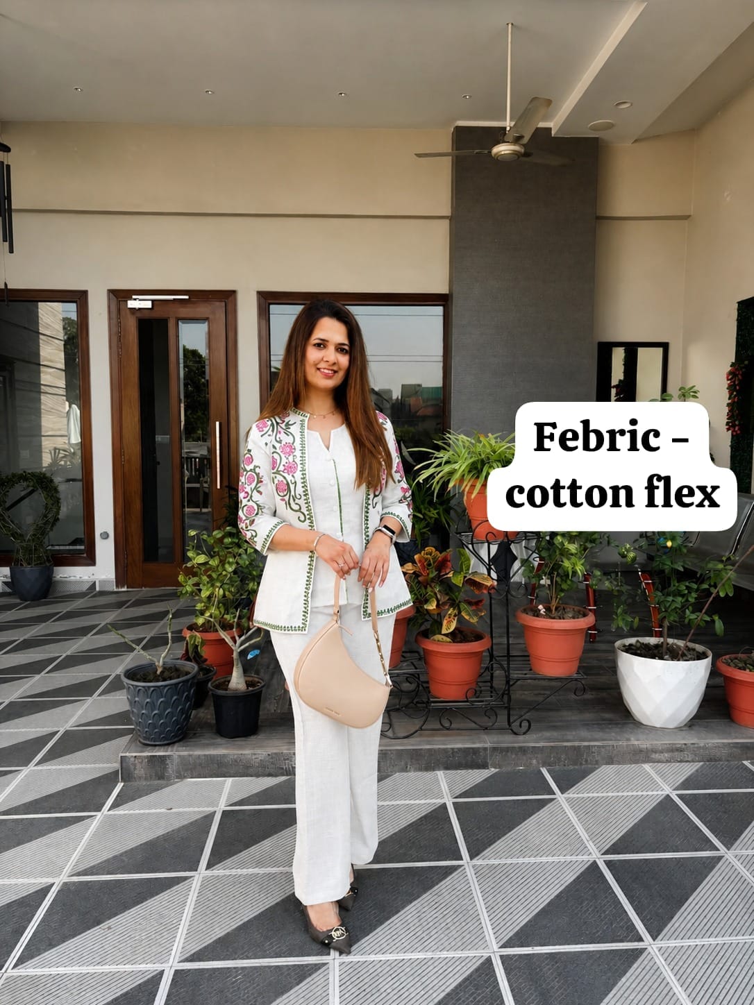 Label Tanuja- jacket style top ,inner and straight trousers, crafted in cotton flex fabric.
