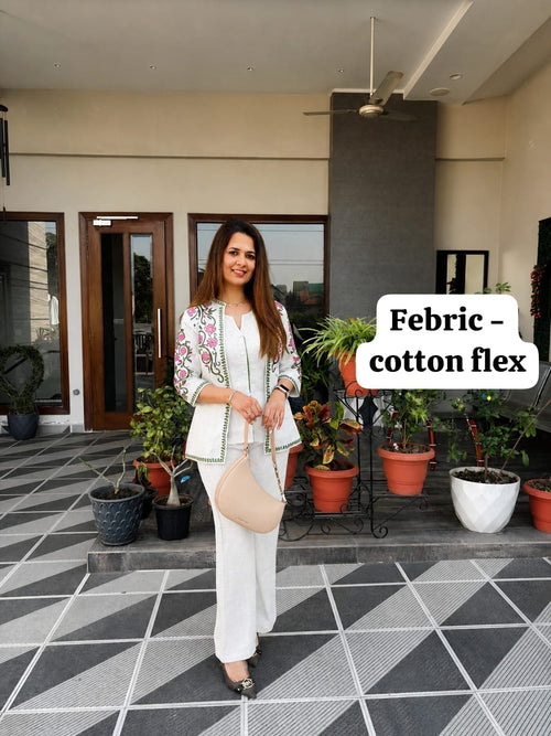 Label Tanuja- jacket style top ,inner and straight trousers, crafted in cotton flex fabric.