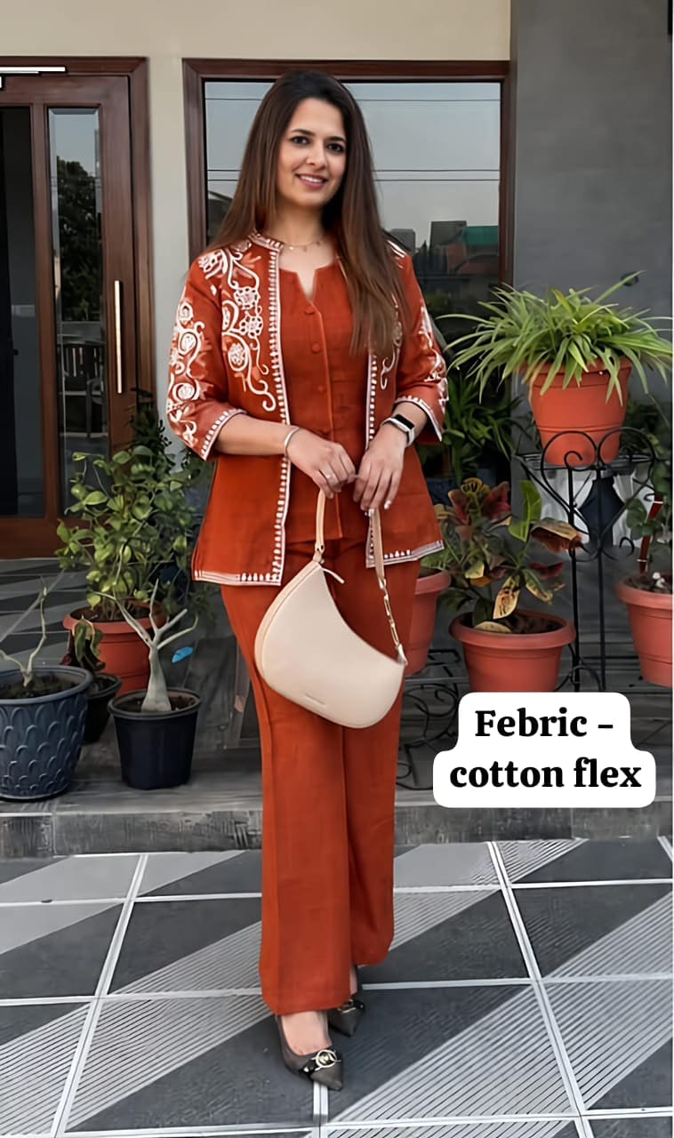Label Tanuja- jacket style top ,inner and straight trousers, crafted in cotton flex fabric.