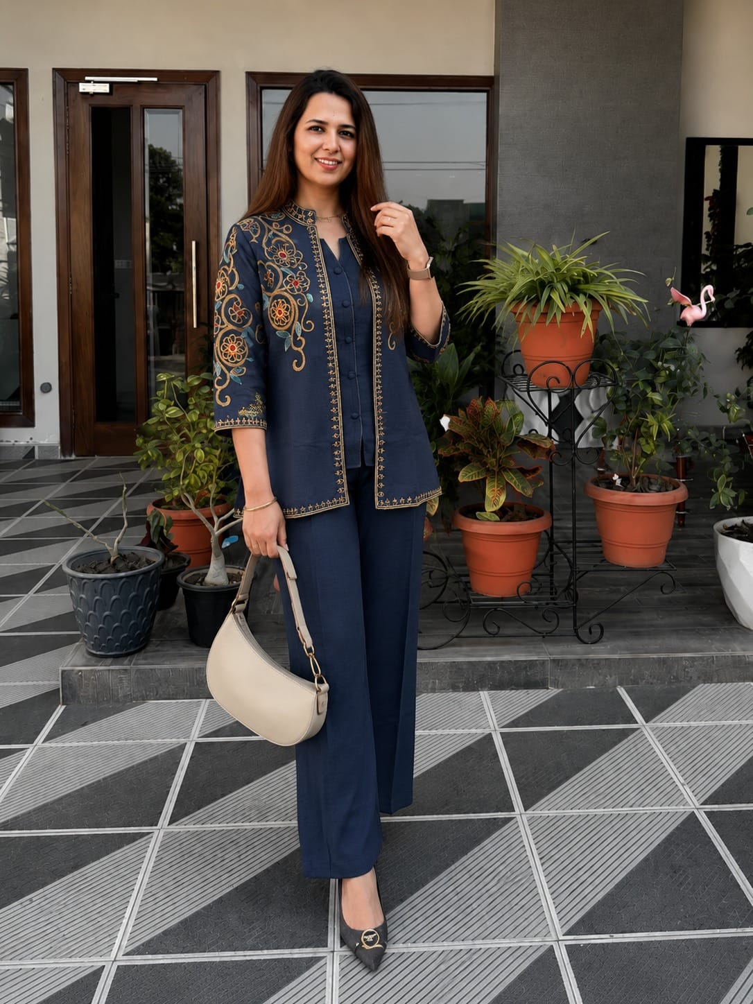 Label Tanuja- jacket style top ,inner and straight trousers, crafted in cotton flex fabric.